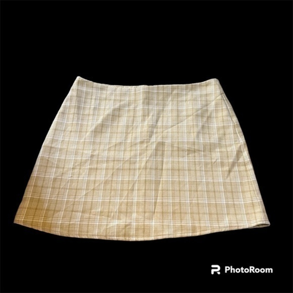 Cream plaid crescent mini skirt
